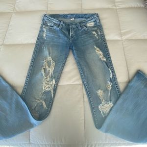 Distressed Silver jeans sized 28“ x 33“ bootleg/slight flare leg.